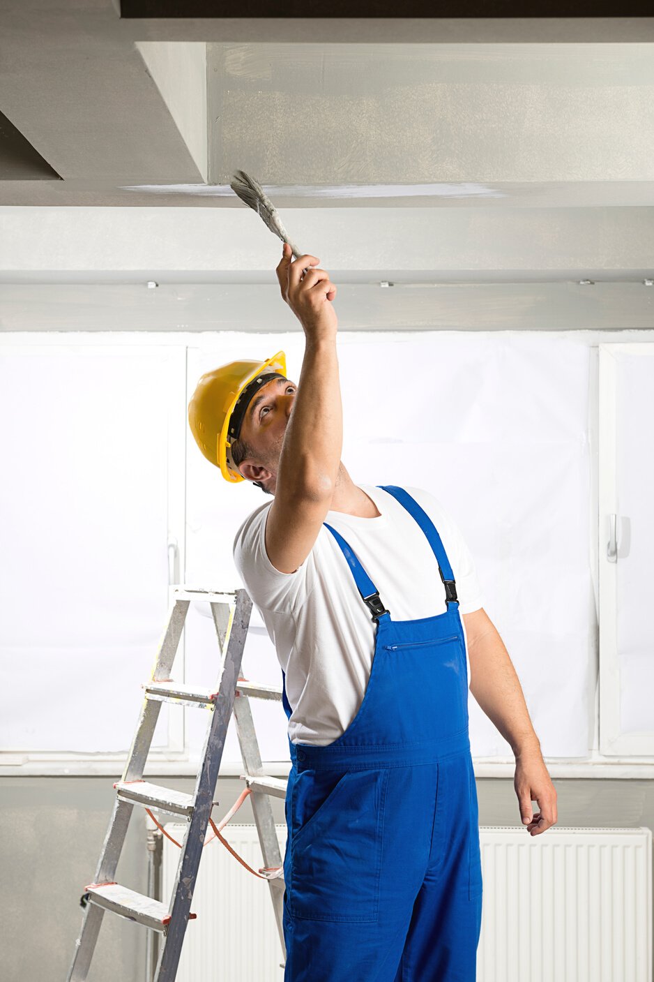 Worker Painting House Interior